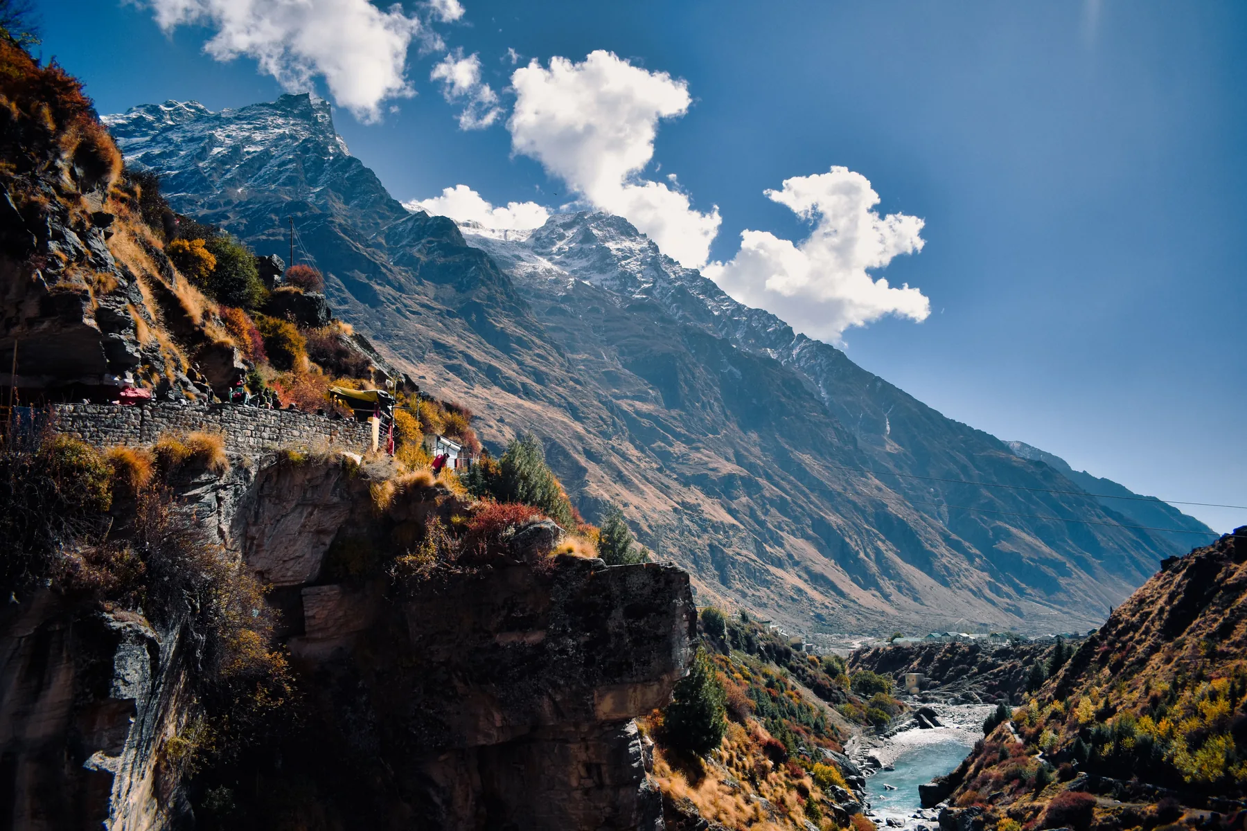 Dramatic Himalayan valley with river and mountain road